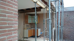 Foto, dragende wand weggebroken